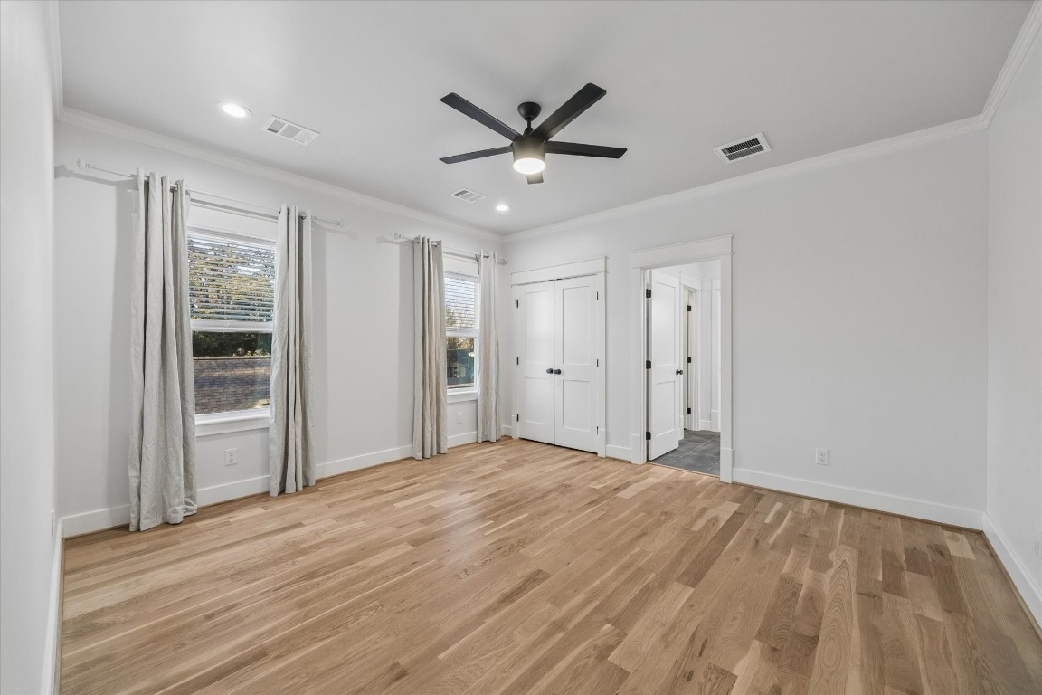 910 Northwood Street Houston, TX 77009 - Photo 23 of 41 a view of an empty room with a ceiling fan