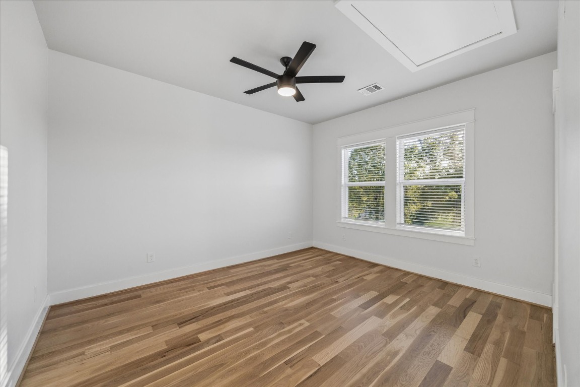 910 Northwood Street Houston, TX 77009 - Photo 28 of 41 a view of a livingroom with a ceiling fan and window