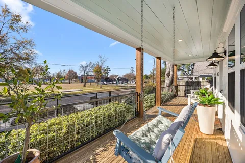 a front view of a house with a porch