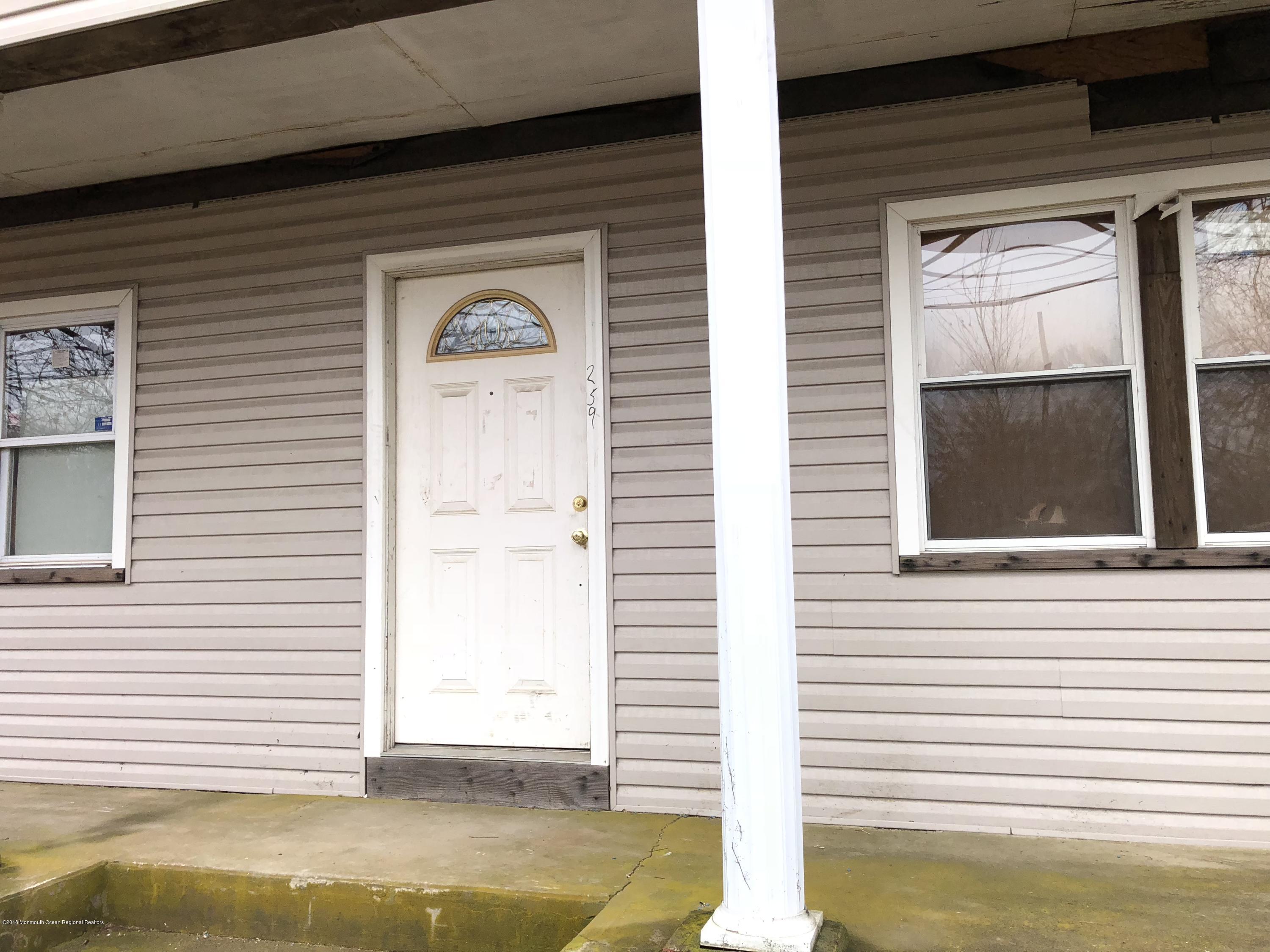 259 Amboy Road Matawan, NJ 07747 - Photo 12 of 15 a view of a windows and an entryway