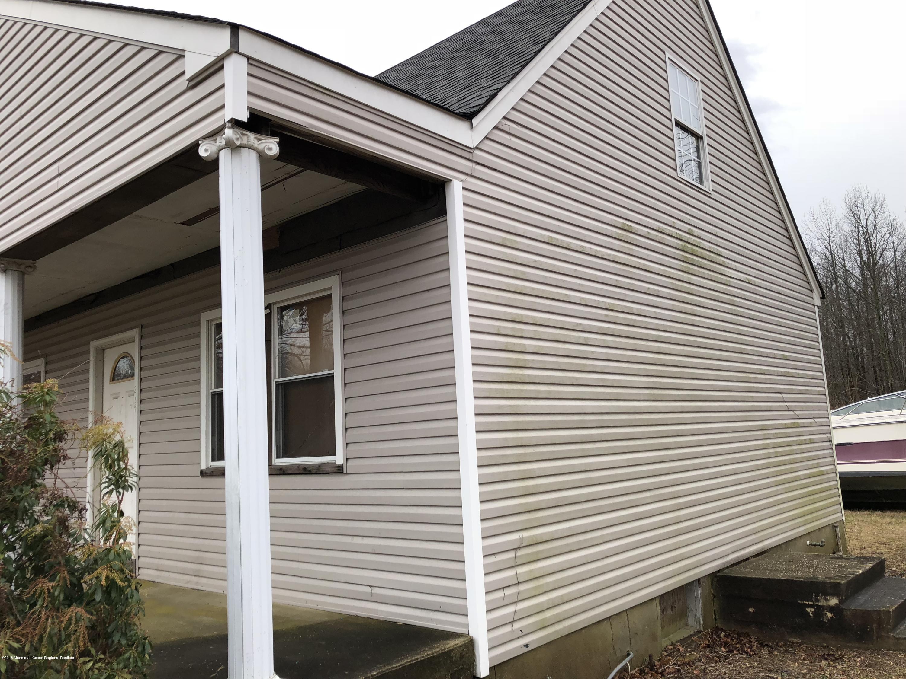 259 Amboy Road Matawan, NJ 07747 - Photo 13 of 15 a view of a house with a white door