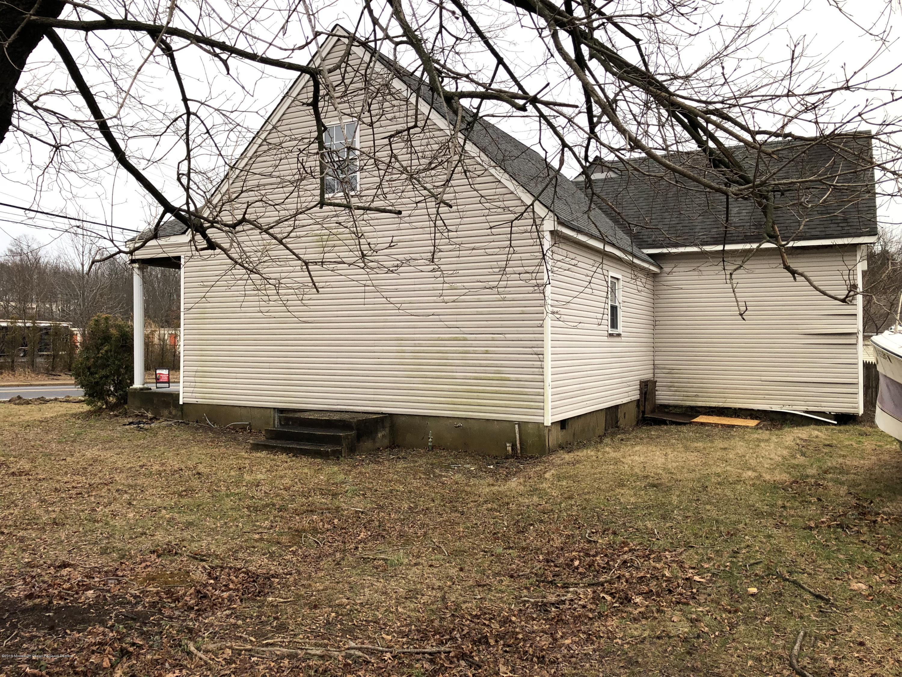 259 Amboy Road Matawan, NJ 07747 - Photo 14 of 15 a view of a house with a yard
