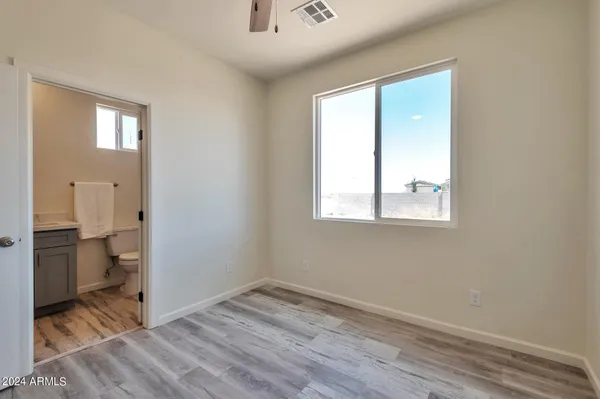 a view of a room that has a window in it