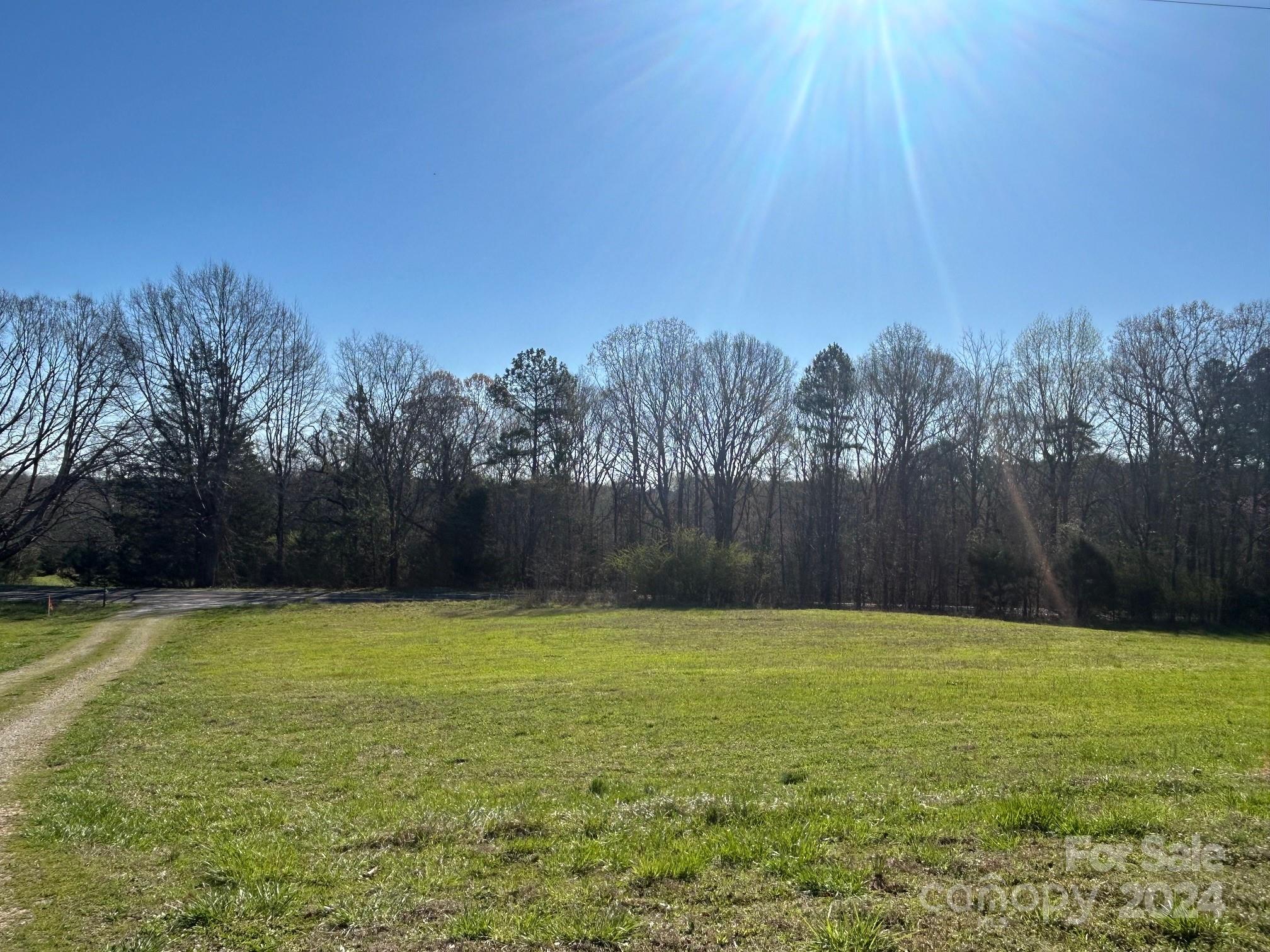7.74-ac Mt Prospect Road Chester, SC 29706 - Photo 8 of 18 a view of a swimming pool and trees in the background
