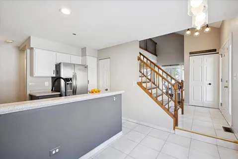 a view of a hallway with staircase