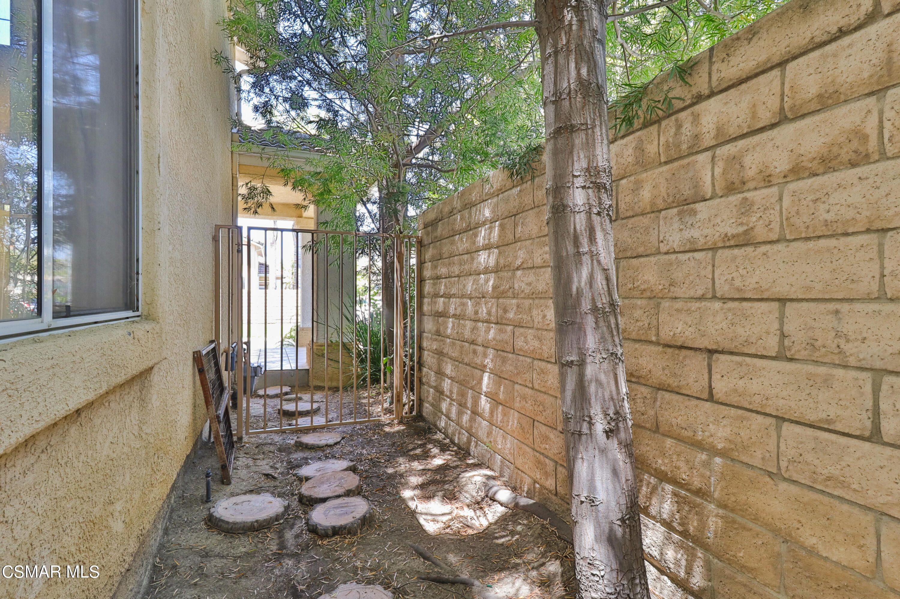 292 Maywind Lane Simi Valley, CA 93065 - Photo 33 of 41 a view of a porch with chairs and a yard