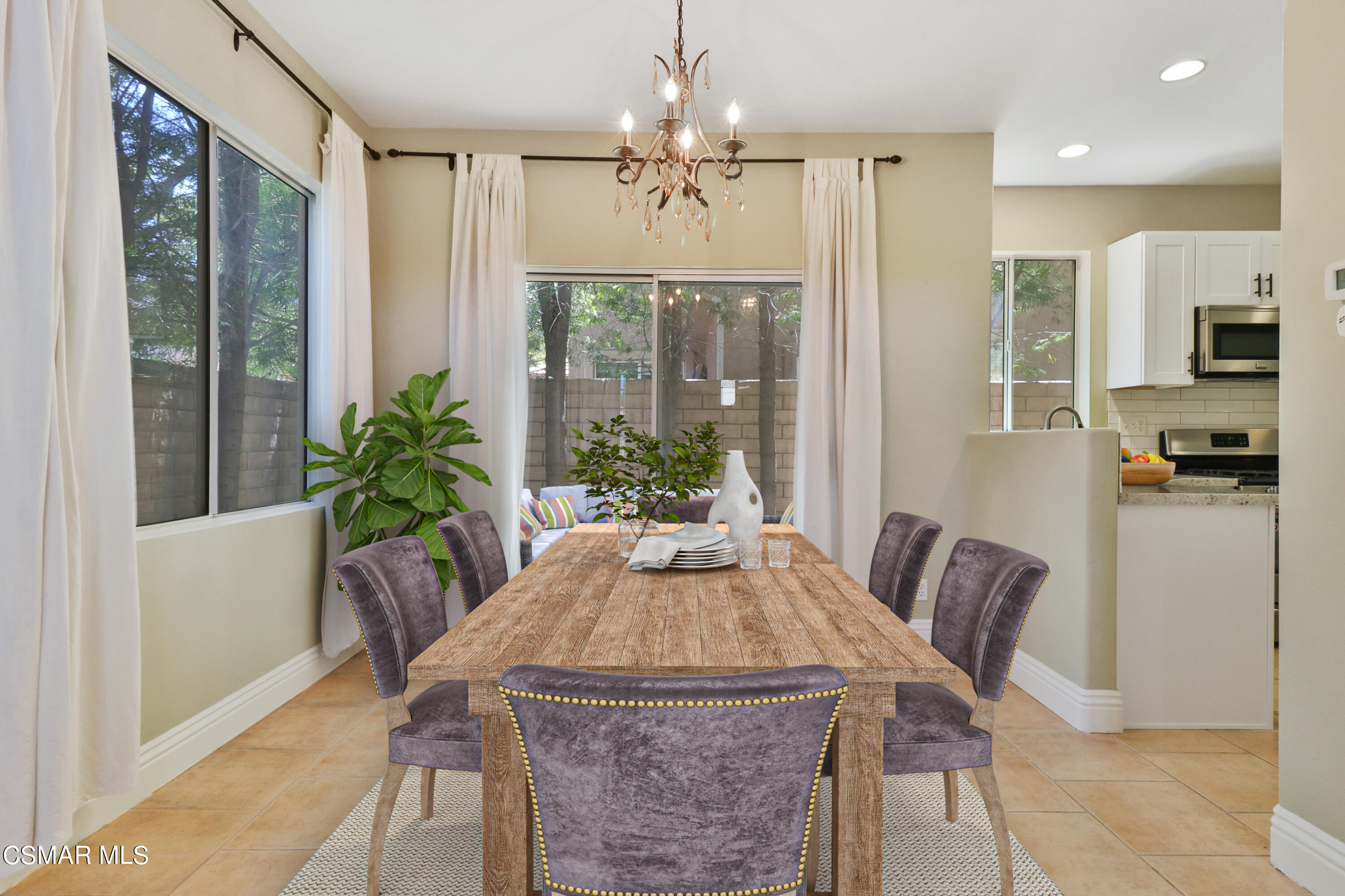 292 Maywind Lane Simi Valley, CA 93065 - Photo 8 of 41 a view of a dining room with furniture window and wooden floor