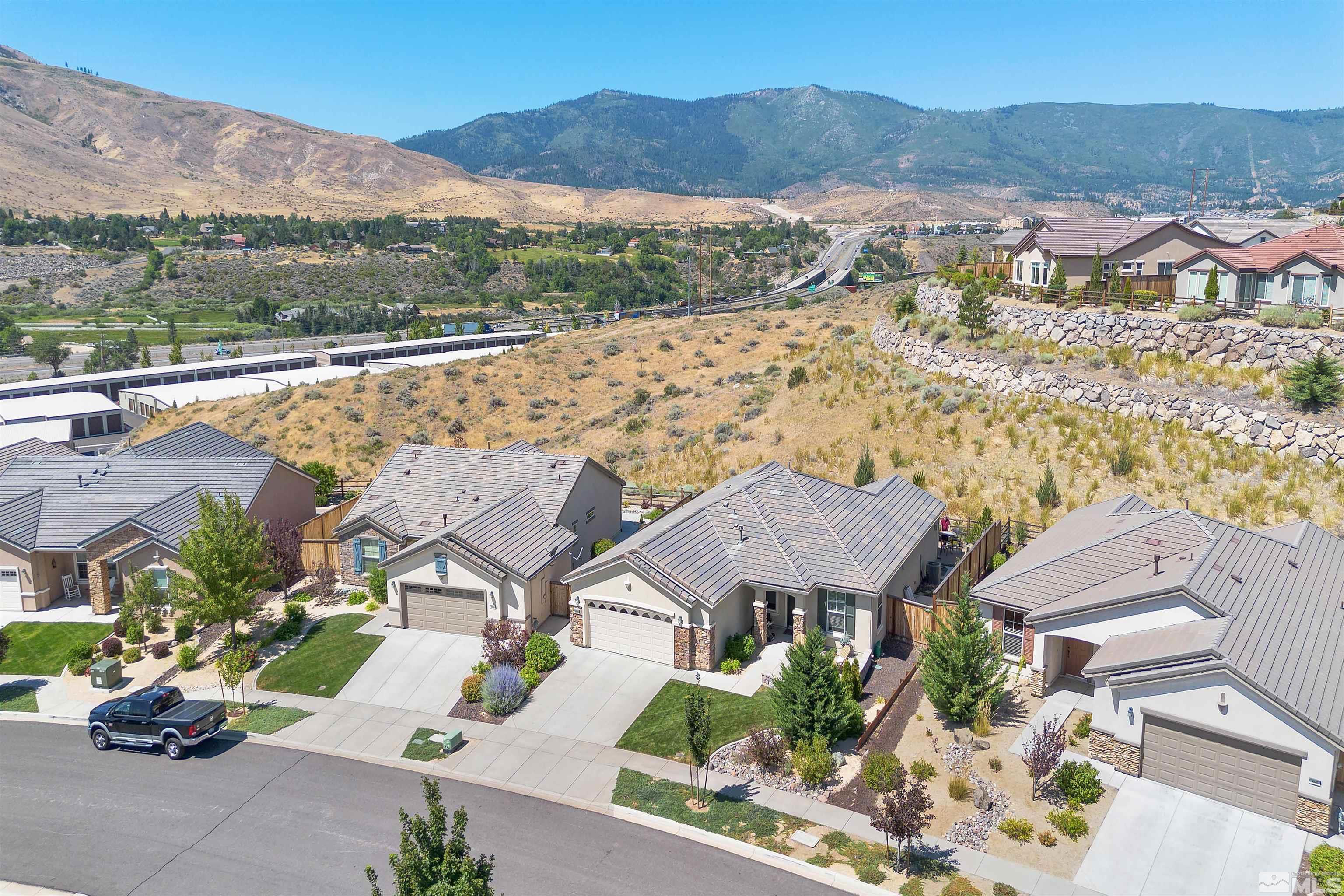855 Larrimore Trail Reno, NV 89523 - Photo 2 of 26 an aerial view of residential houses with outdoor space