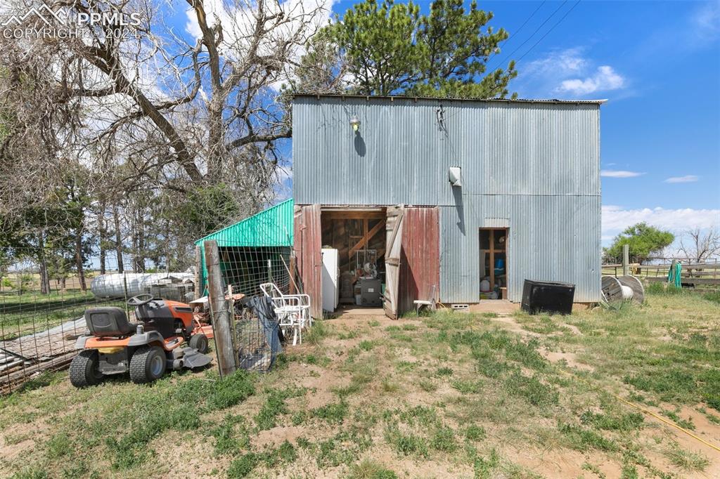 40150 Rapp Road Rush, CO 80833 - Photo 20 of 39 a view of a house with backyard and sitting area