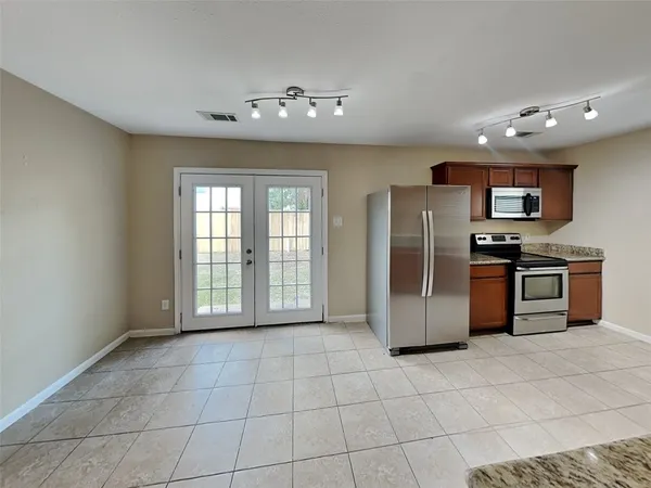 $1,860 | 11830 Rolling Stream Drive, Tomball, TX 77375