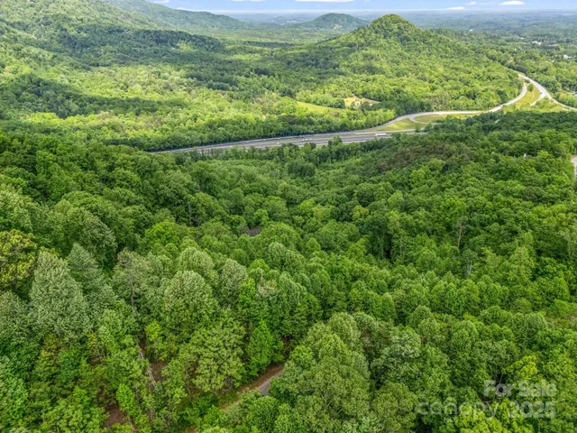 a view of a yard with an outdoor space