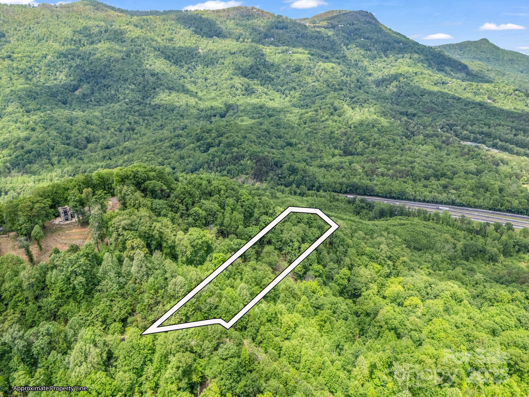 0 Ragans Point, Unit 31 Columbus, NC 28722 - Photo 8 of 25 a view of a tennis court