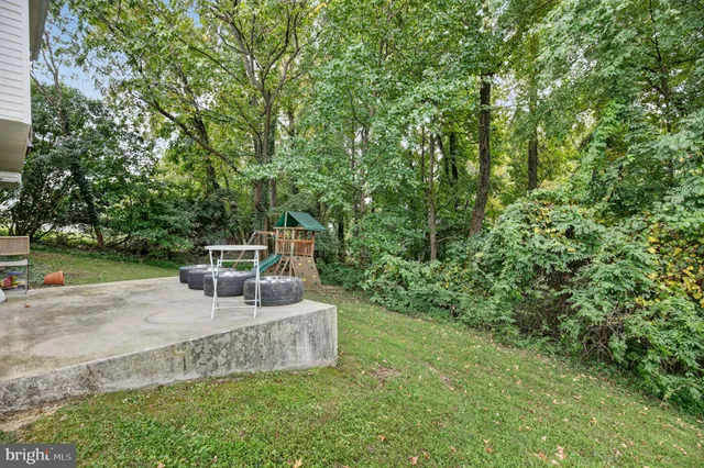 a house view with a sitting space and garden view