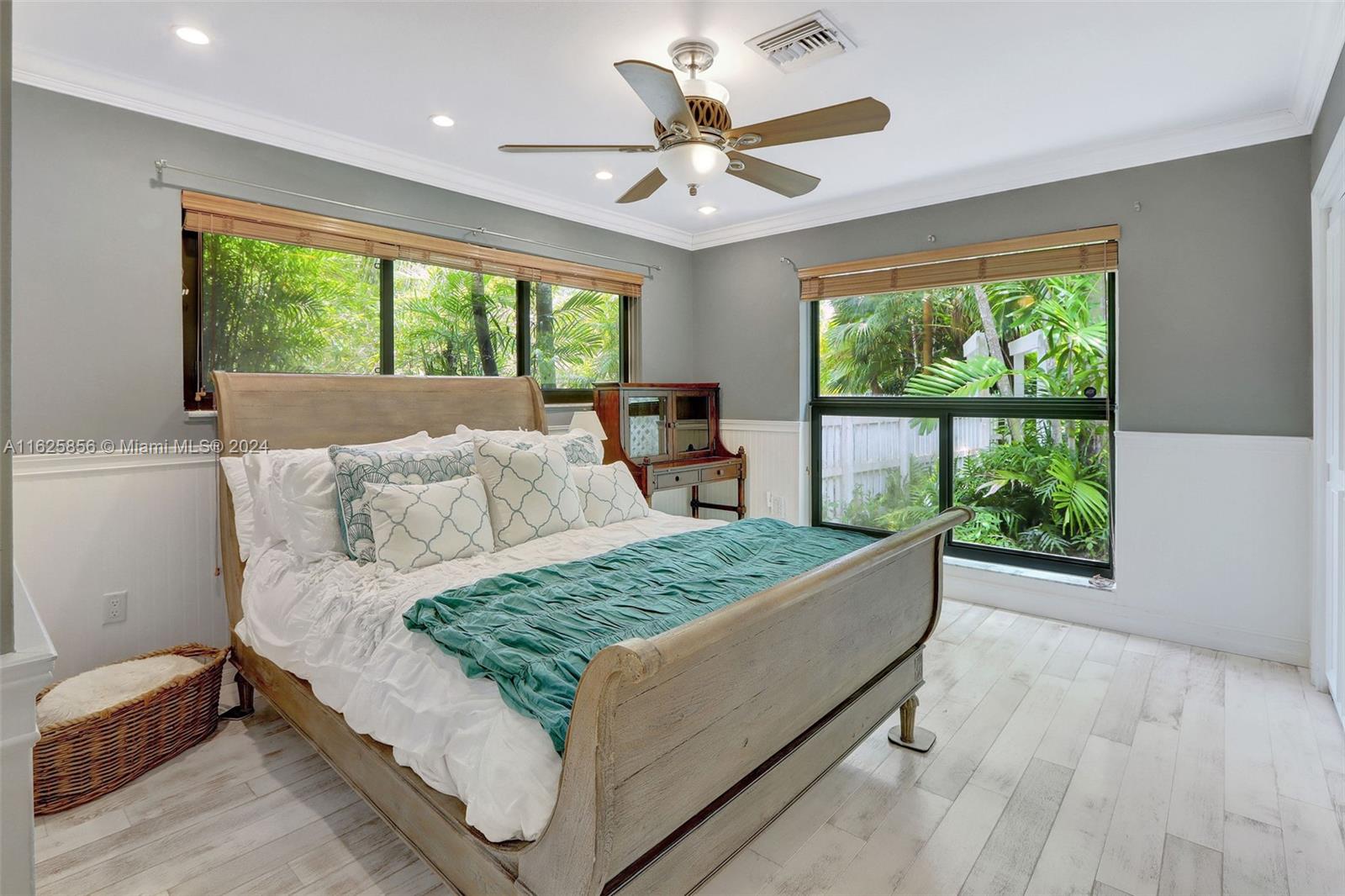 9290 Southwest 117th Terrace Miami, FL 33176 - Photo 13 of 26 a living room with a bed furniture and a large window