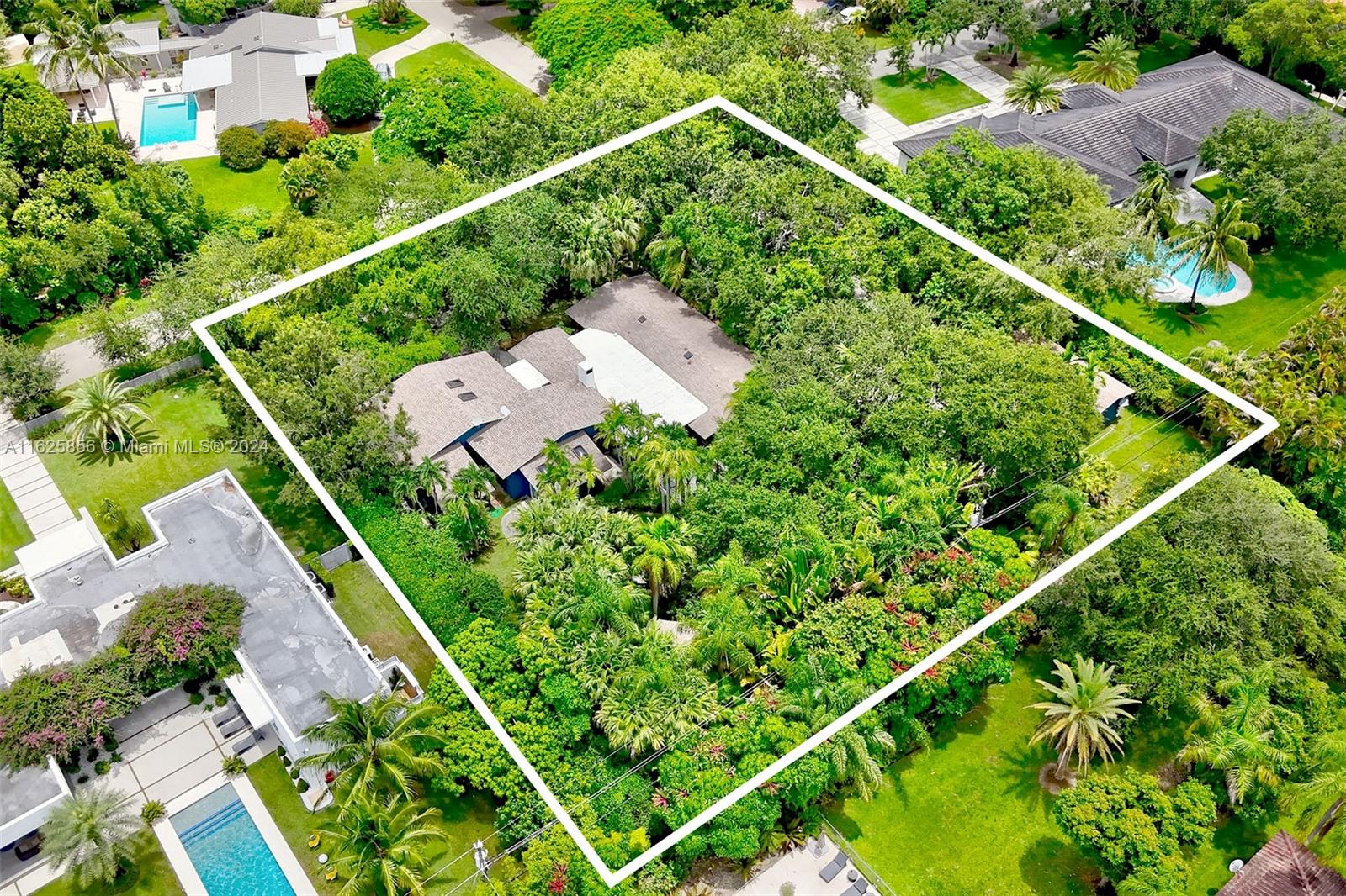 9290 Southwest 117th Terrace Miami, FL 33176 - Photo 25 of 26 an aerial view of a tennis court