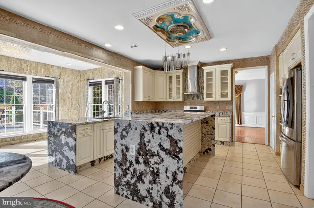 a very nice looking dining room with furniture