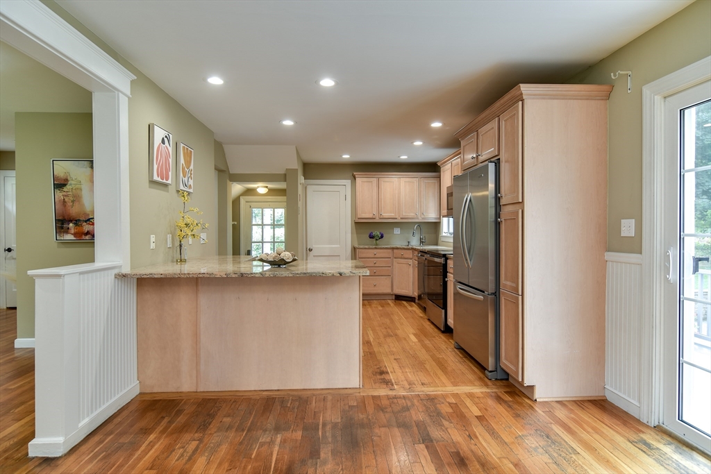 48 Edgebrook Road Framingham, MA 01701 - Photo 11 of 29 a kitchen with stainless steel appliances granite countertop a refrigerator and a sink