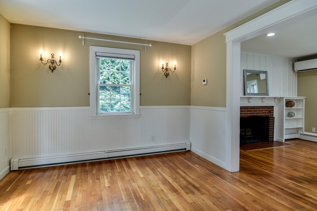 48 Edgebrook Road Framingham, MA 01701 - Photo 12 of 29 wooden floor in an empty room with a window