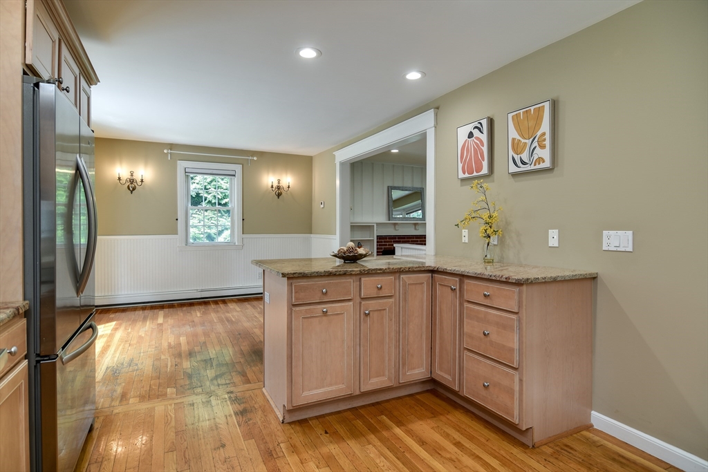 48 Edgebrook Road Framingham, MA 01701 - Photo 14 of 29 a spacious bathroom with a granite countertop sink a mirror and shower