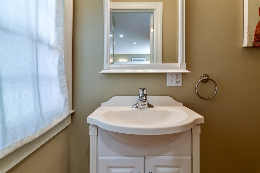 48 Edgebrook Road Framingham, MA 01701 - Photo 16 of 29 a bathroom with a sink and a mirror