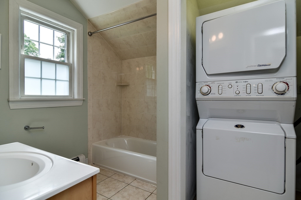 48 Edgebrook Road Framingham, MA 01701 - Photo 17 of 29 a bathroom with a sink a toilet and bathtub