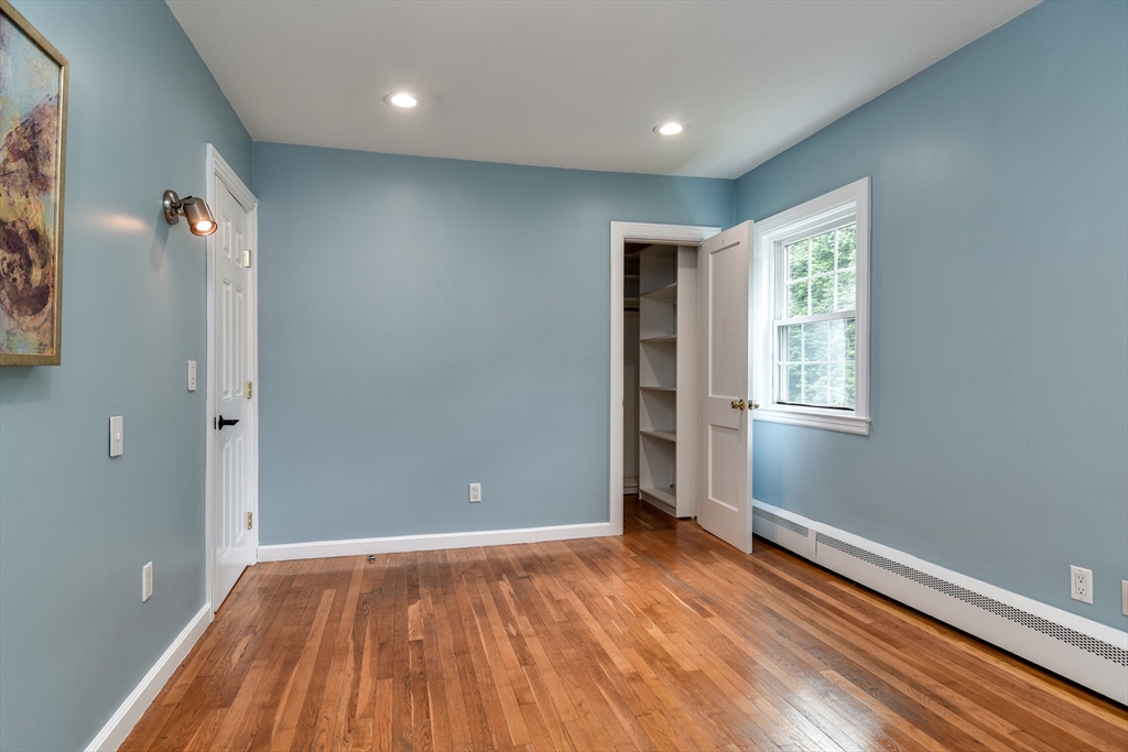 48 Edgebrook Road Framingham, MA 01701 - Photo 20 of 29 wooden floor in an empty room with a window