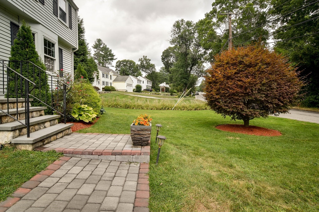 48 Edgebrook Road Framingham, MA 01701 - Photo 25 of 29 a view of a back yard of the house
