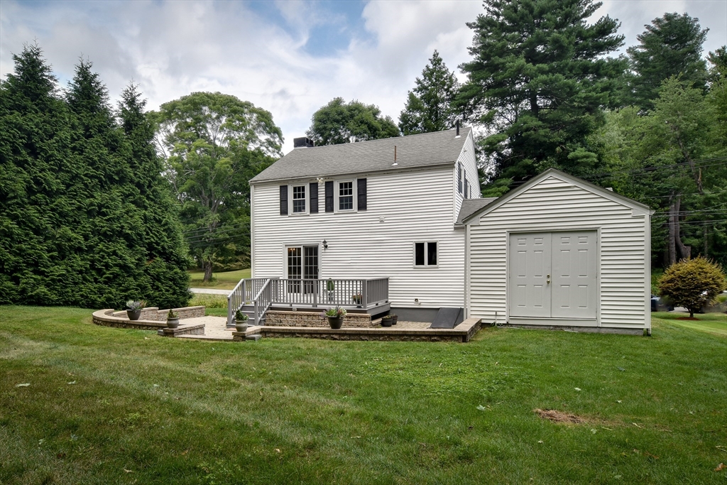 48 Edgebrook Road Framingham, MA 01701 - Photo 27 of 29 a front view of a house with a yard and trees