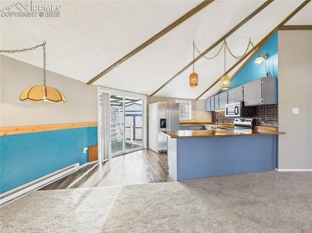 a view of a hallway with an entryway