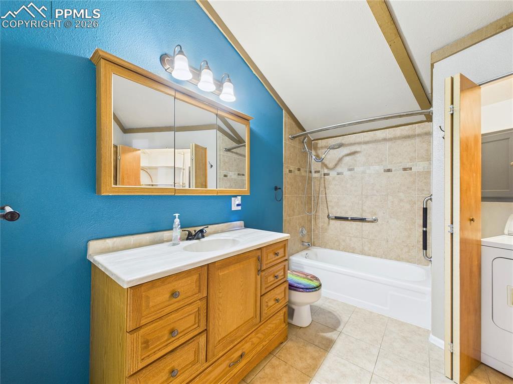 4 Bridgeport Circle Pueblo, CO 81003 - Photo 19 of 42 a bathroom with a sink and a mirror