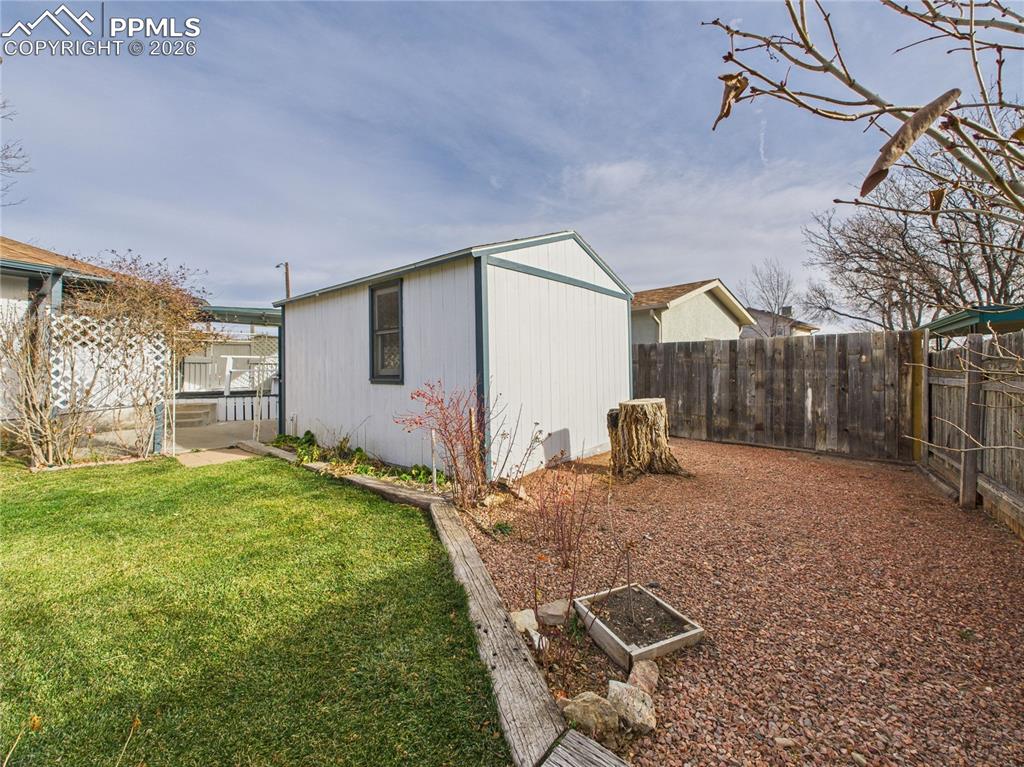 4 Bridgeport Circle Pueblo, CO 81003 - Photo 33 of 42 a view of a backyard with furniture and a patio
