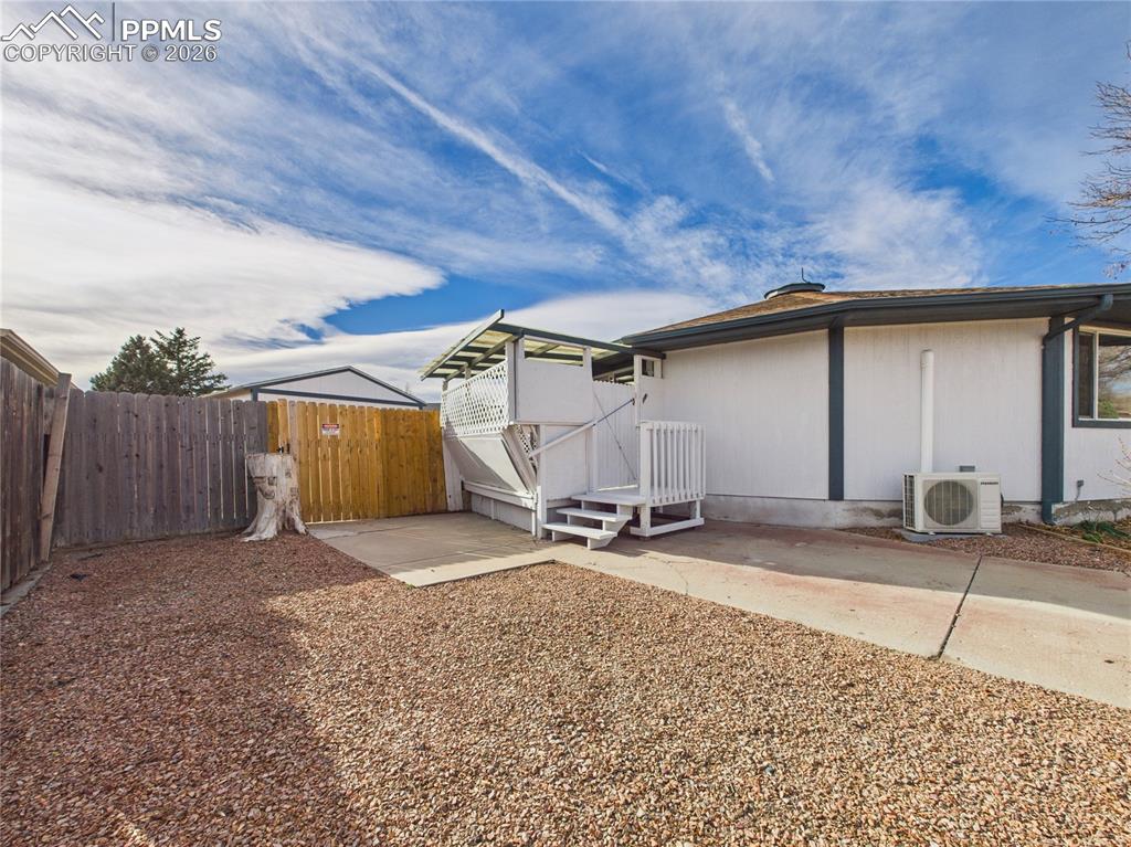 4 Bridgeport Circle Pueblo, CO 81003 - Photo 4 of 42 a backyard of a house