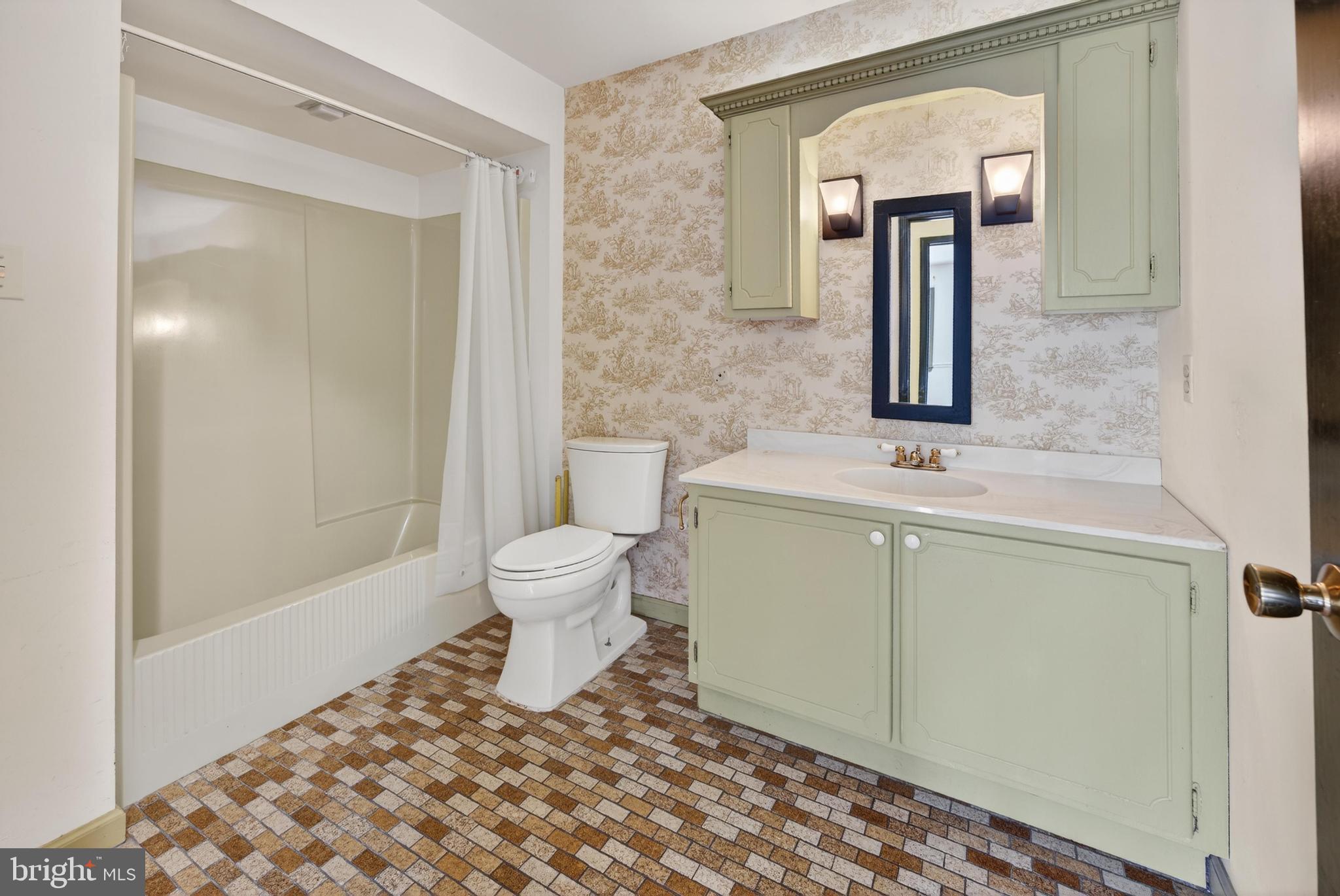 425 Stokes Road Shamong, NJ 08088 - Photo 20 of 35 a bathroom with a toilet a sink and mirror