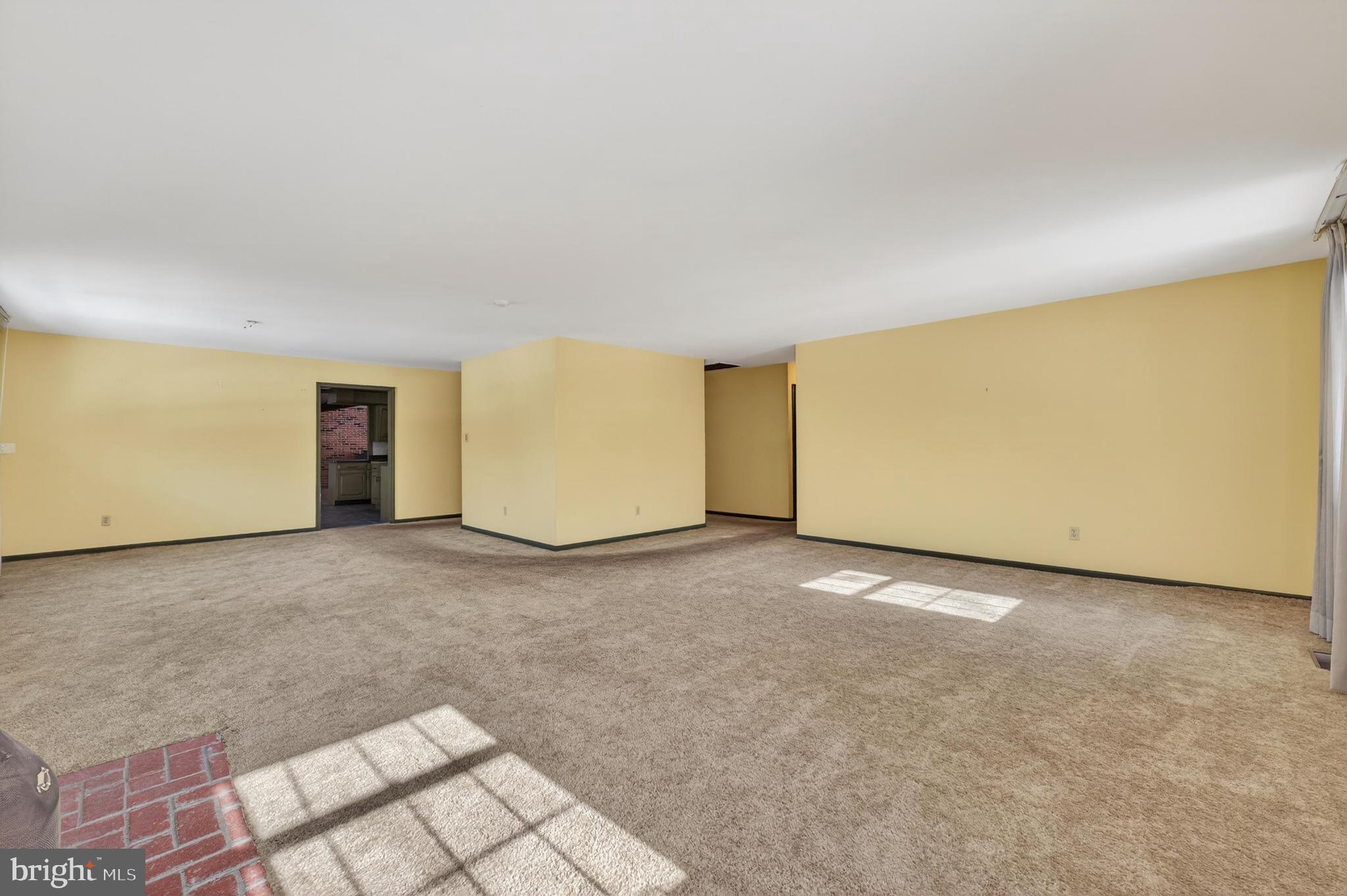 425 Stokes Road Shamong, NJ 08088 - Photo 6 of 35 a view of an empty room with a window