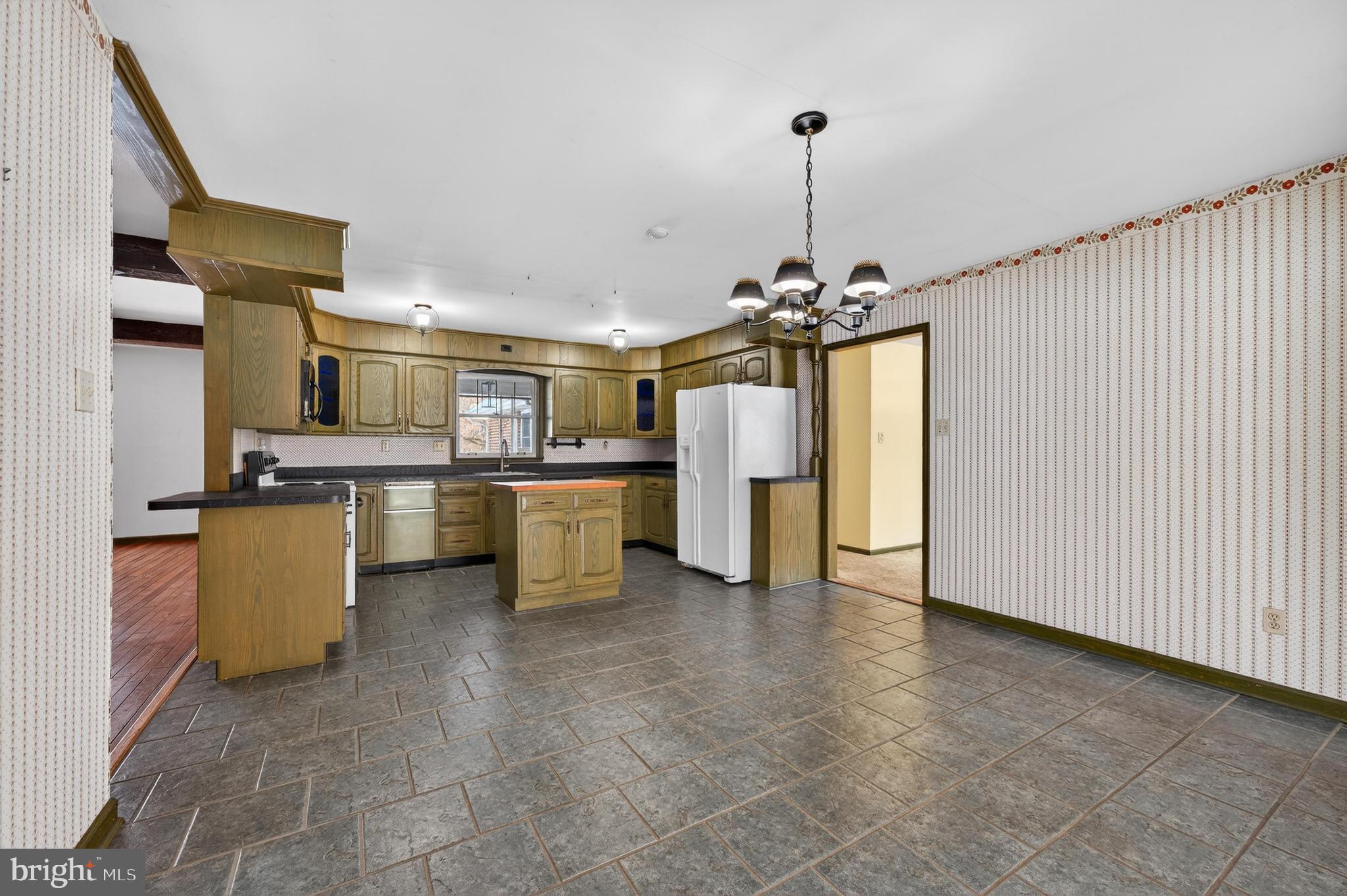 425 Stokes Road Shamong, NJ 08088 - Photo 9 of 35 a view of a kitchen with refrigerator and cabinets