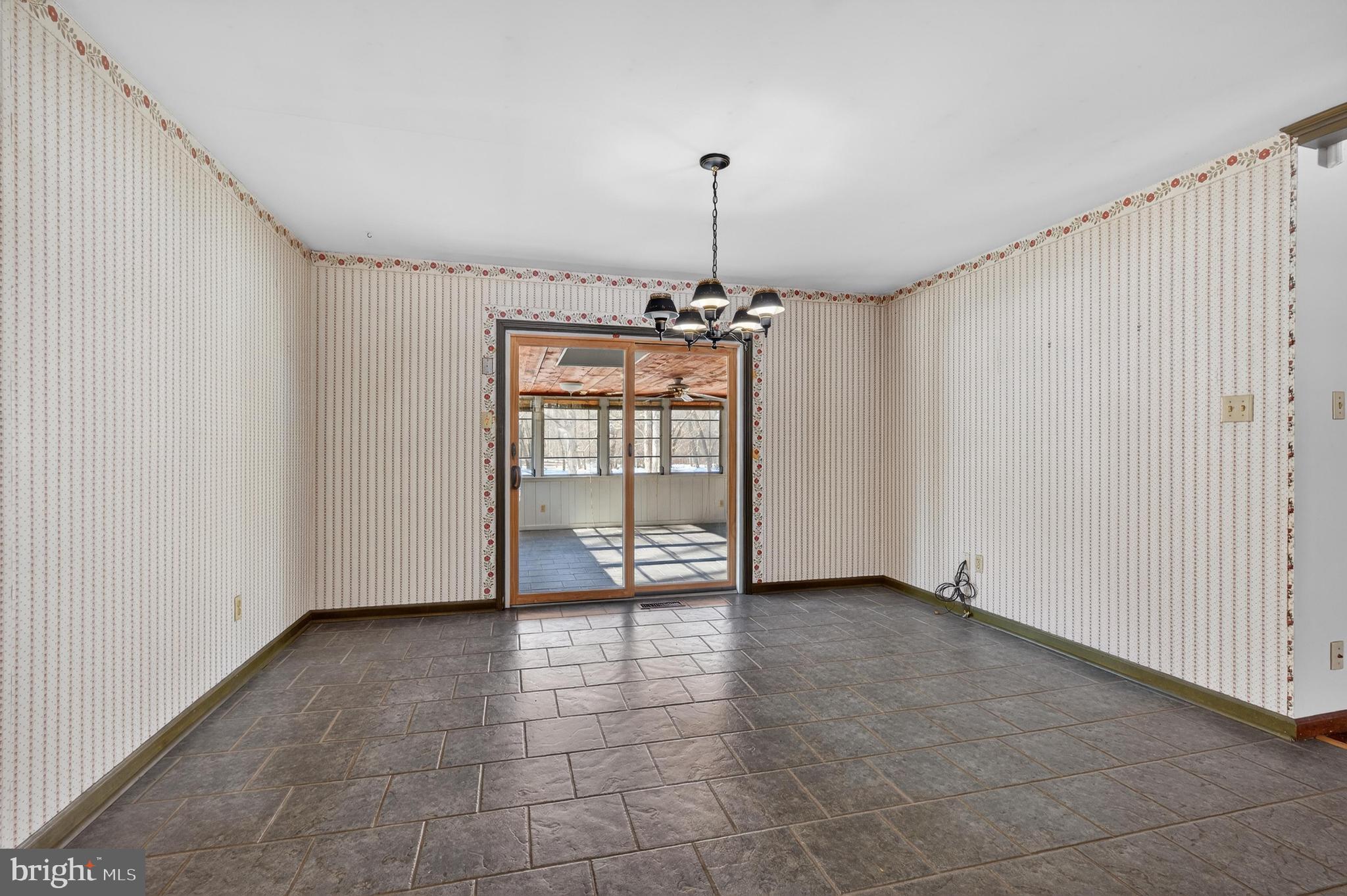425 Stokes Road Shamong, NJ 08088 - Photo 10 of 35 a view of an empty room with a window