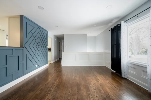 a view of entryway with wooden floor