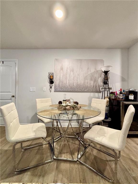 1367 Midnight Ride Drive Hampton, GA 30228 - Photo 11 of 62 a view of a dining room with furniture