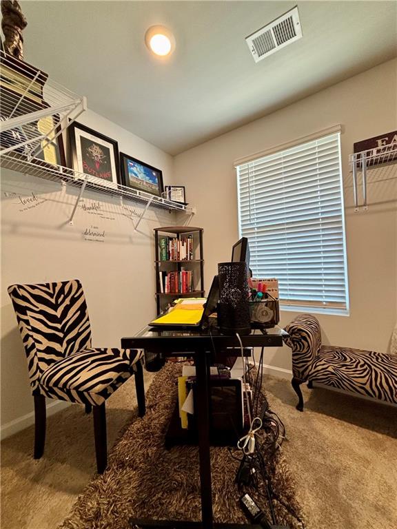 1367 Midnight Ride Drive Hampton, GA 30228 - Photo 22 of 62 a bedroom with furniture and a window