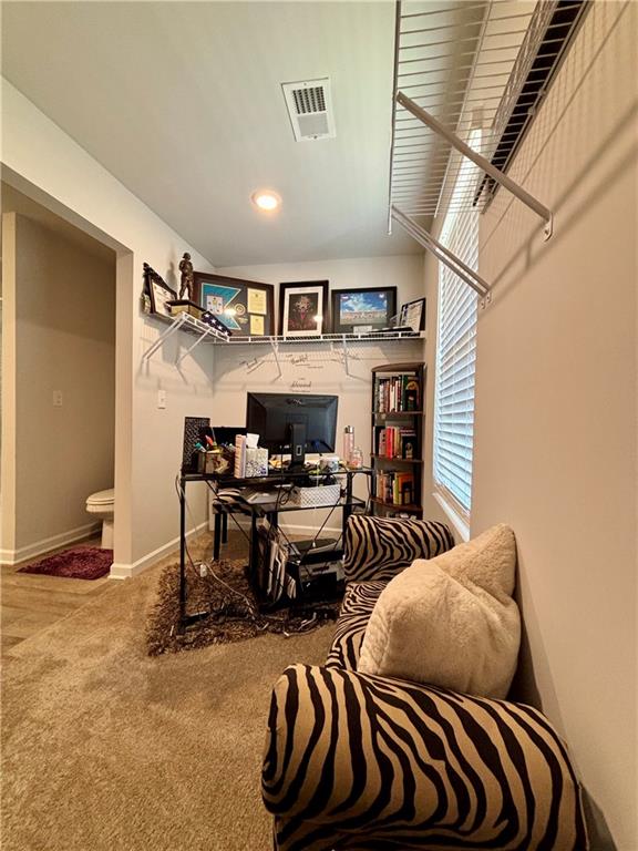 1367 Midnight Ride Drive Hampton, GA 30228 - Photo 24 of 62 a bedroom with furniture and a rug