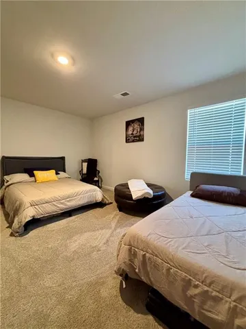a bathroom with a tub and a shower