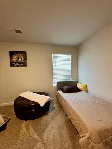 a living room with chairs