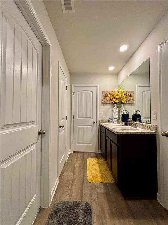 1367 Midnight Ride Drive Hampton, GA 30228 - Photo 39 of 62 a bathroom with a sink and a mirror