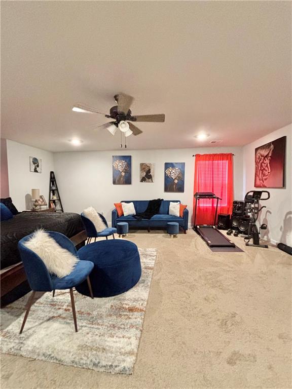 1367 Midnight Ride Drive Hampton, GA 30228 - Photo 49 of 62 a living room with furniture a couch and a window
