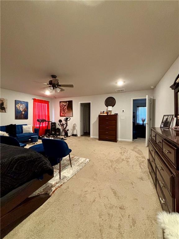1367 Midnight Ride Drive Hampton, GA 30228 - Photo 50 of 62 a living room with furniture and a flat screen tv