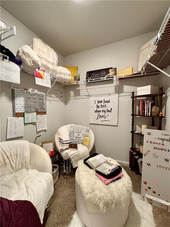 1367 Midnight Ride Drive Hampton, GA 30228 - Photo 54 of 62 a bedroom with furniture and a couch