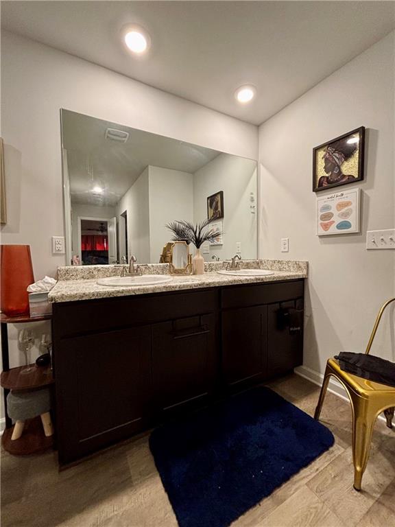 1367 Midnight Ride Drive Hampton, GA 30228 - Photo 56 of 62 a room with a wooden floor and furniture