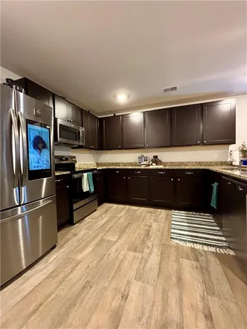 a view of a dining room with furniture