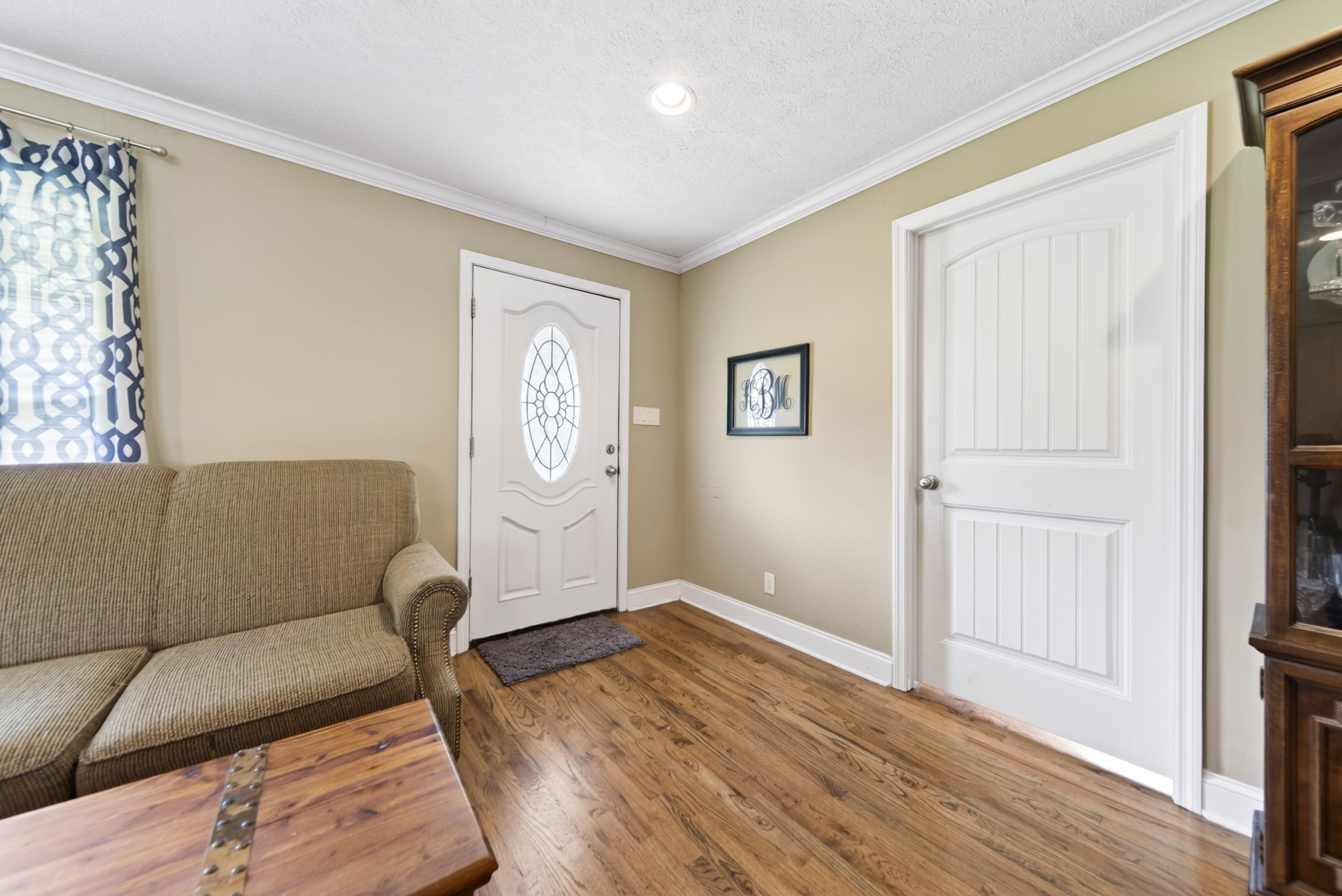 8023 Bethlehem Road Springfield, TN 37172 - Photo 24 of 55 a living room with furniture and wooden floor