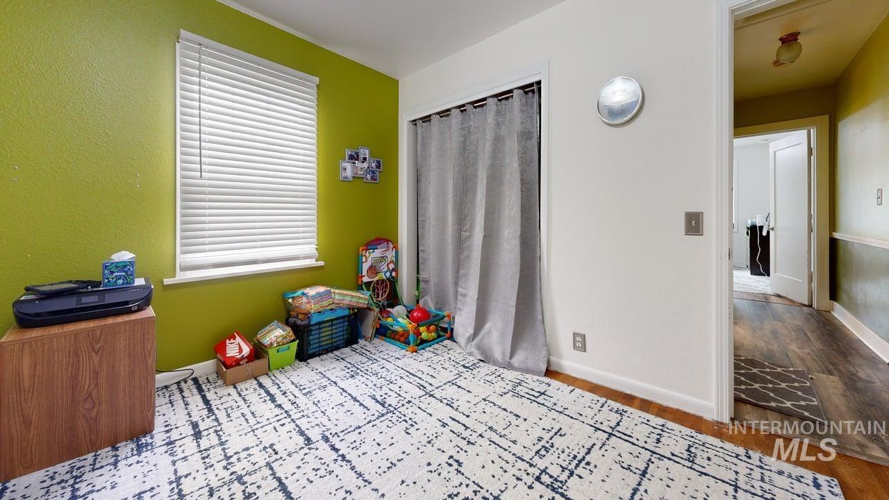 1210 10th Street Lewiston, ID 83501 - Photo 15 of 25 Playroom with wood finished floors and baseboards